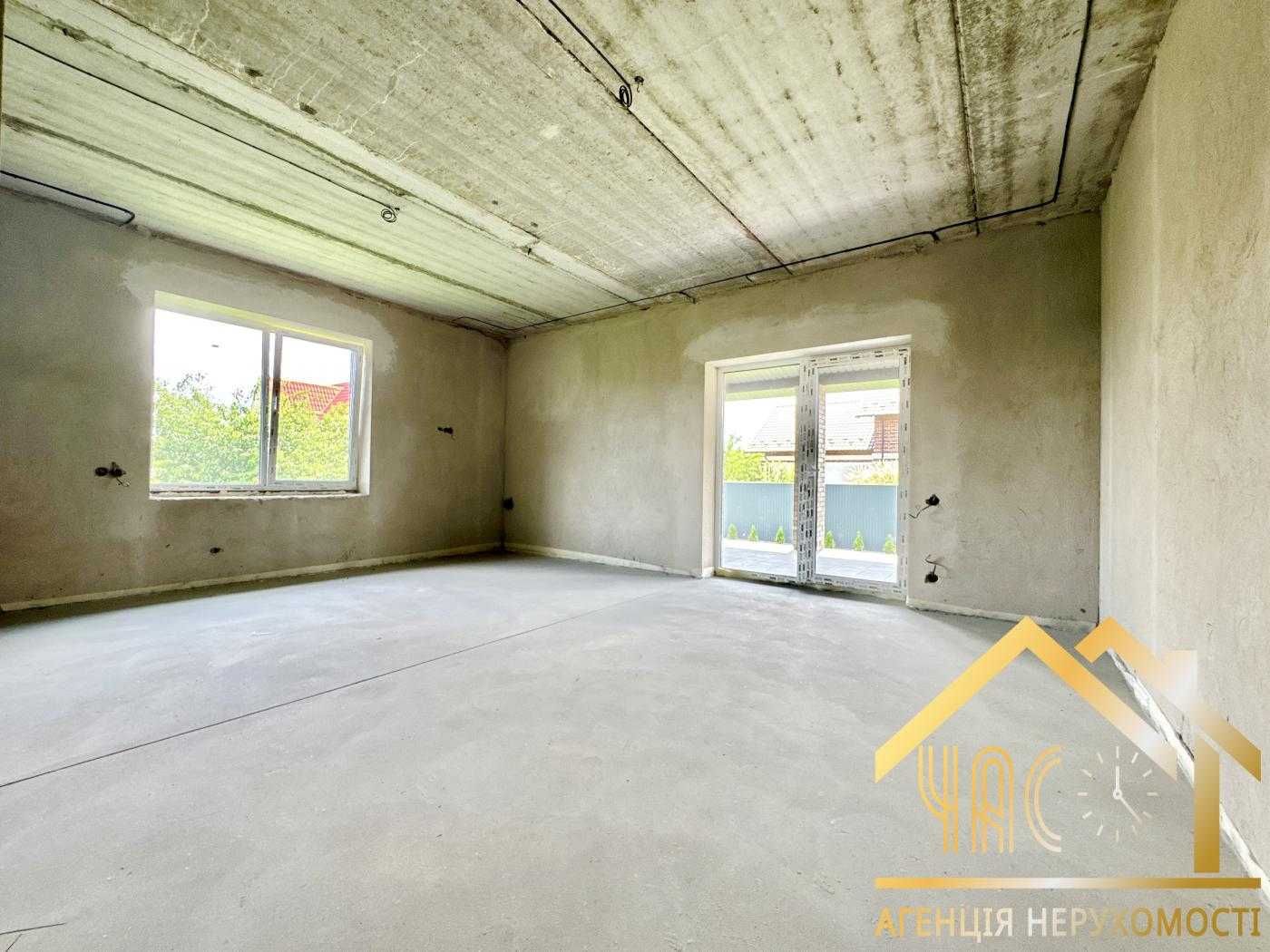 Продаж будинку 228м² з цокольним поверхом, гаражем, навісом та терасою