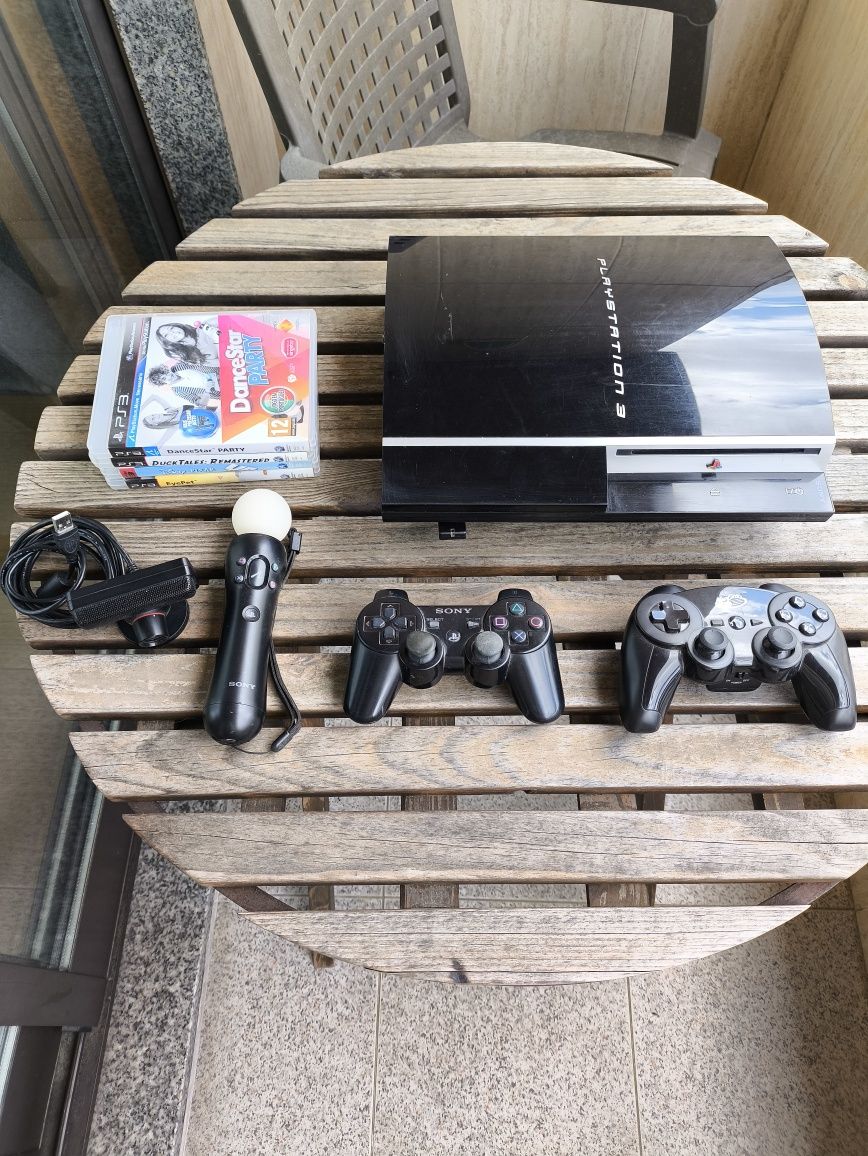 PlayStation 3 com Oferta 4 Jogos, 2 Comandos, 1  Comando Move e Câmera