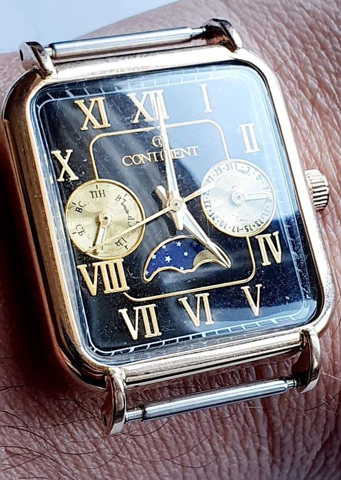 Продам золотые мужские часы ,