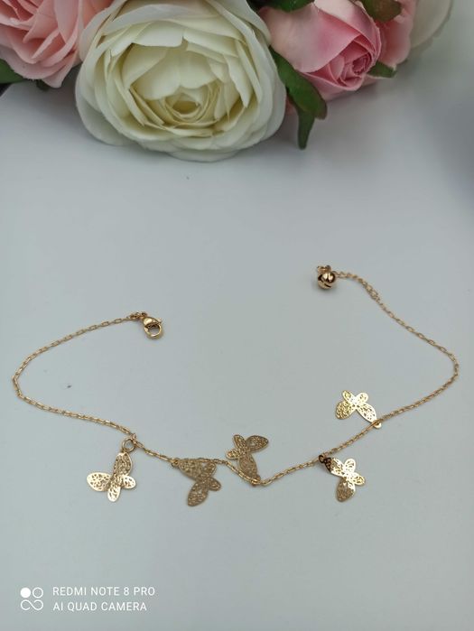 Bransoletka pozłacana 18k złotem na kostkę motylki