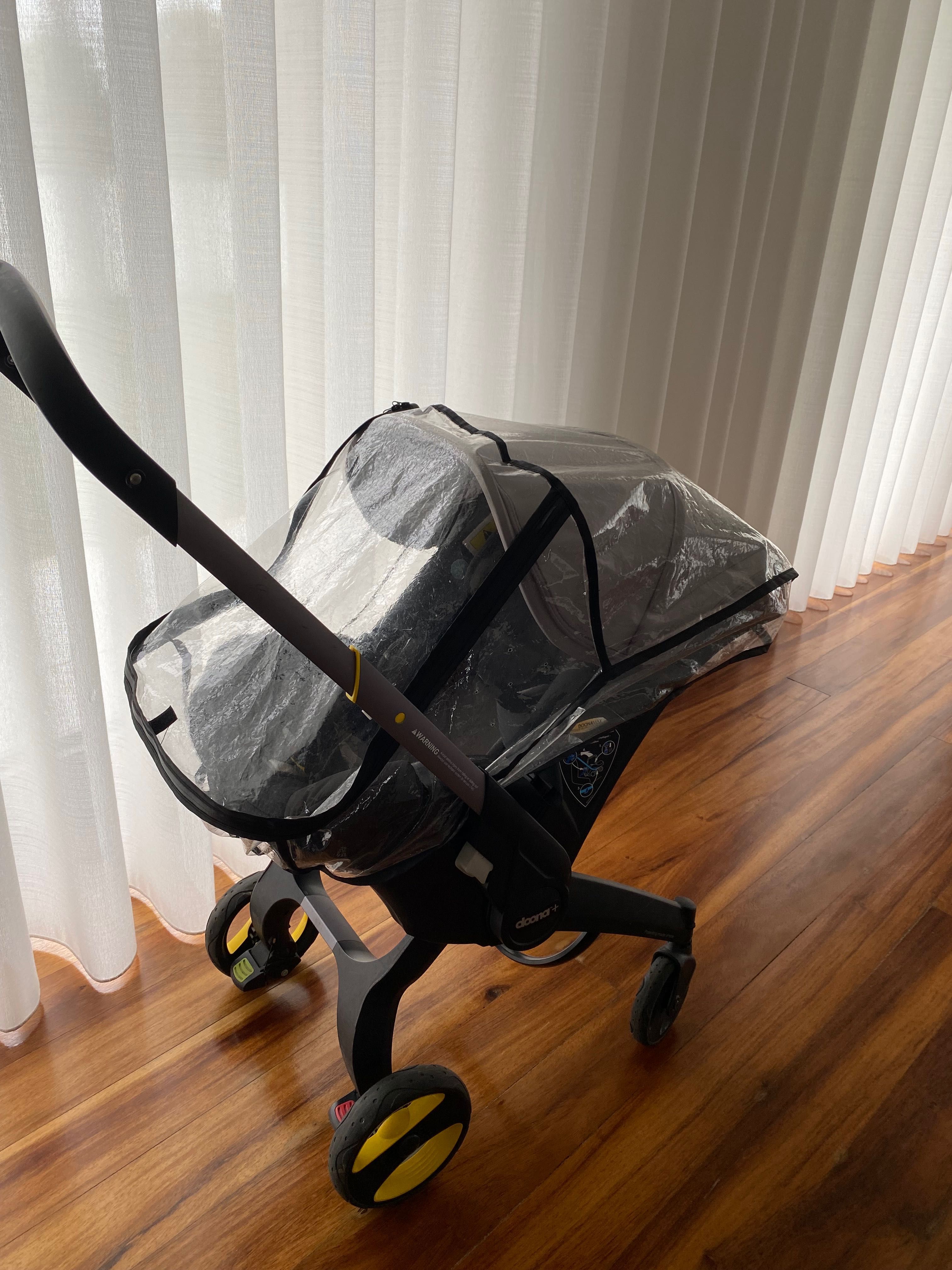 Carrinho, cadeira auto marca doona