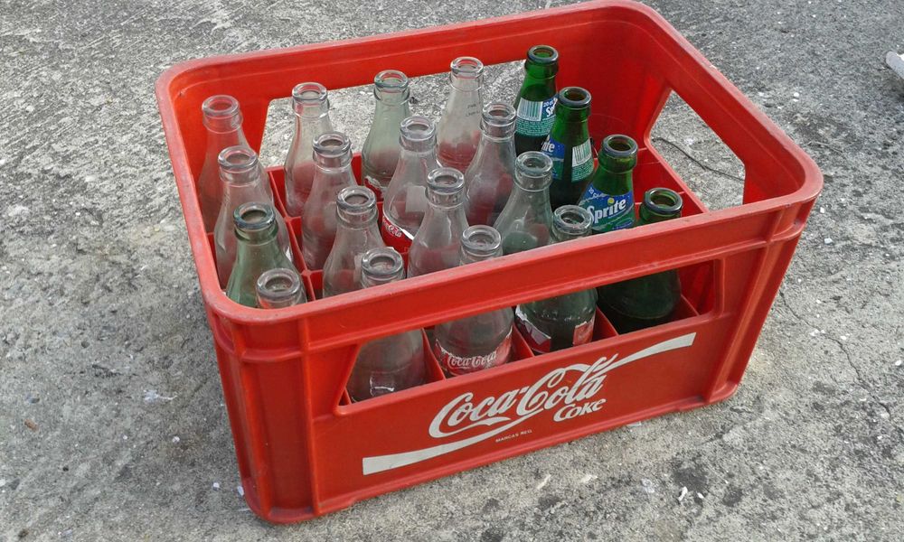 Grade Coca Cola com Garrafas