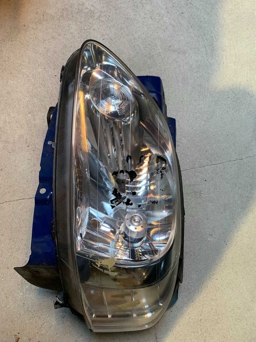 VW POLO FOX 05-   Lampa przednia reflektor lewa + okular