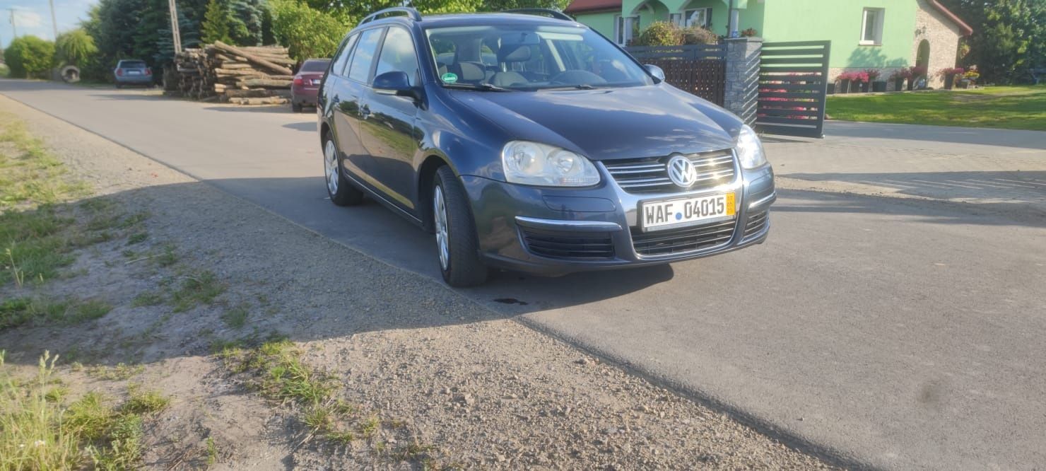 Granatowy vv golf combi