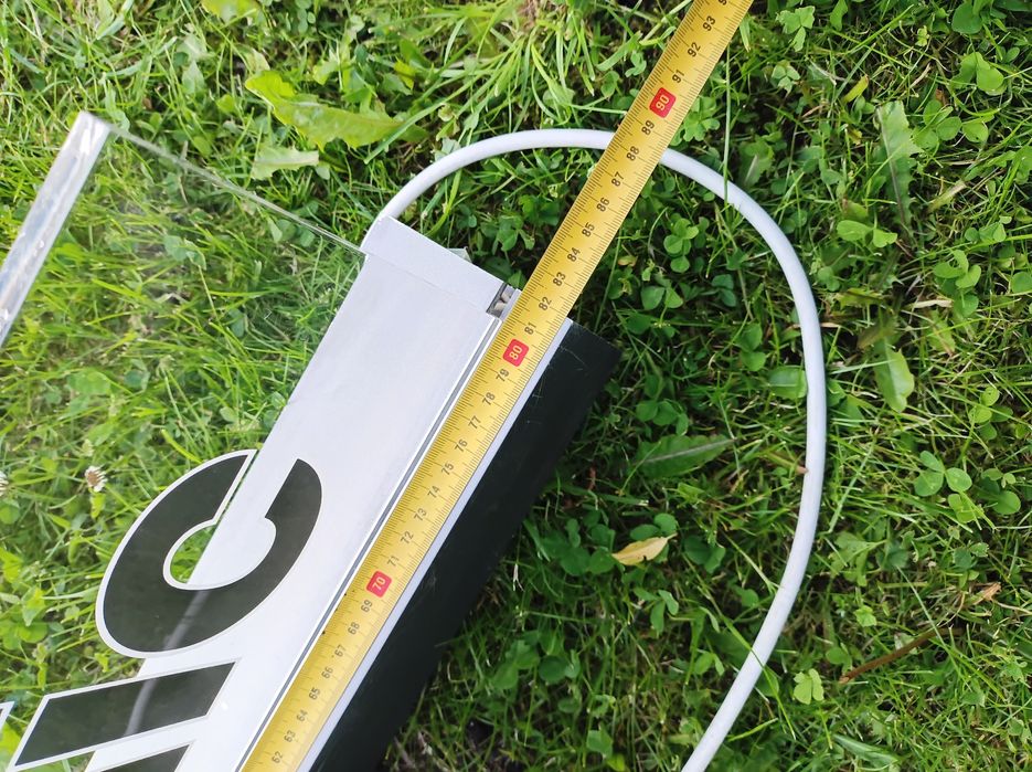 Oryginalny podświetlany szyld reklamowy Panasonic z plexi i podstawą