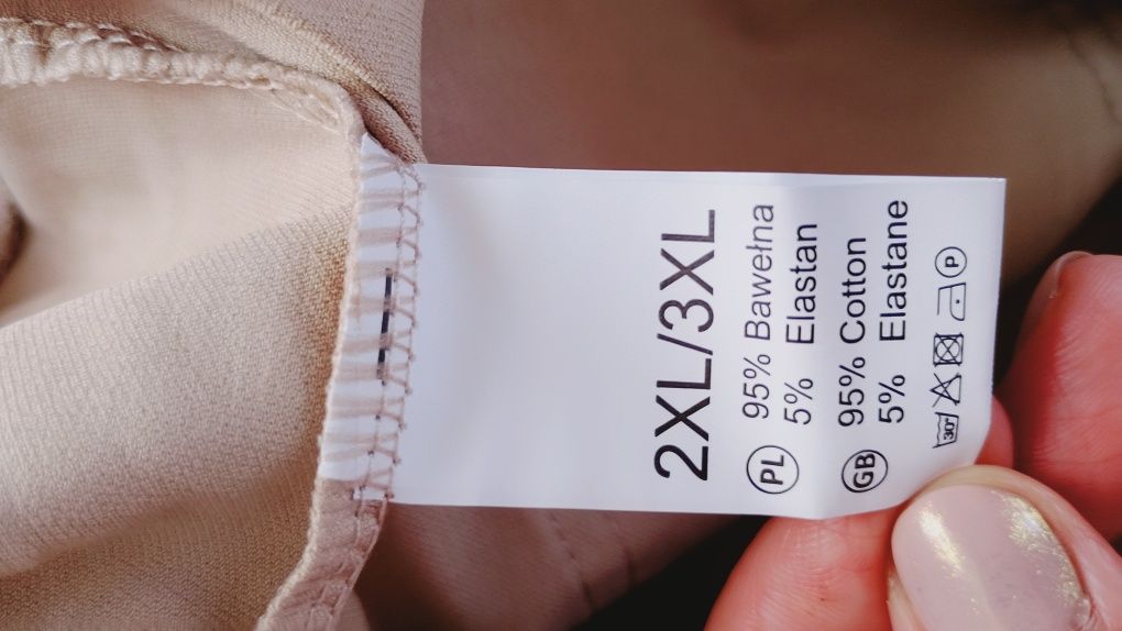 Nowe beżowe spodnie tak zwane gumy, rozm L lXL