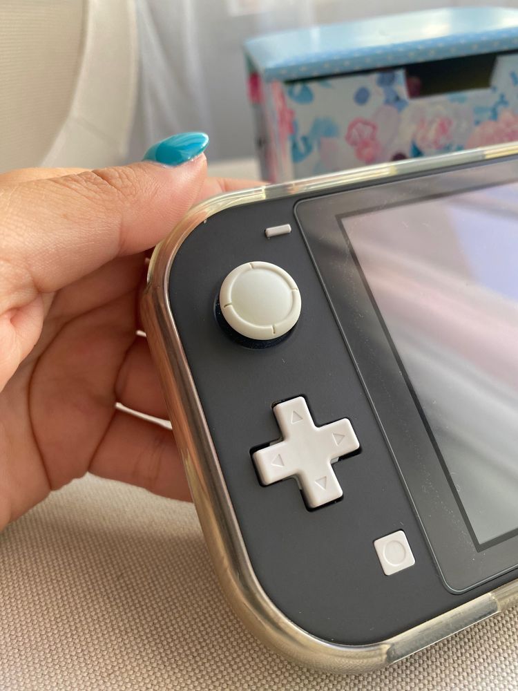 Nintendo switch lite + 3 jogos