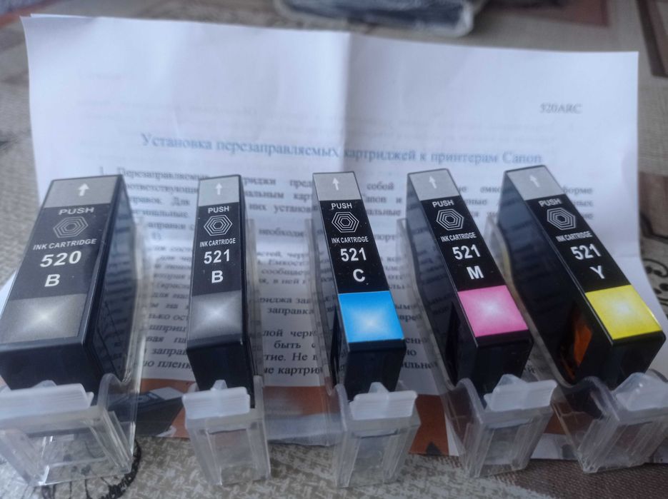 Продам комплект картриджів Canon 520/521 з авточіпами.