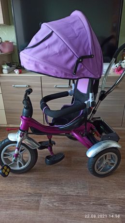 Велосипед девочке трёхколёсный для девочки фиолетовый с капюшоном