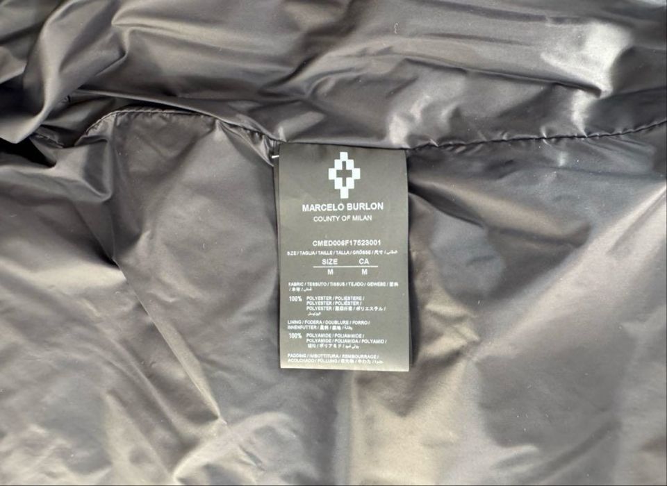 Пуховик marcelo burlon