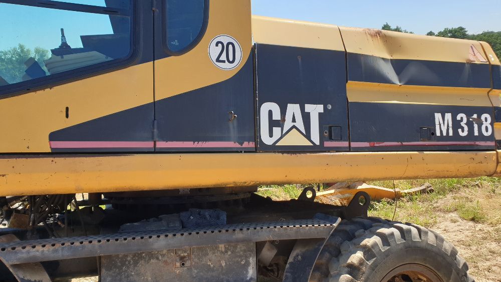koparka cat m 315 m 318 części pług lemiesz siłownik silnik ramie wał