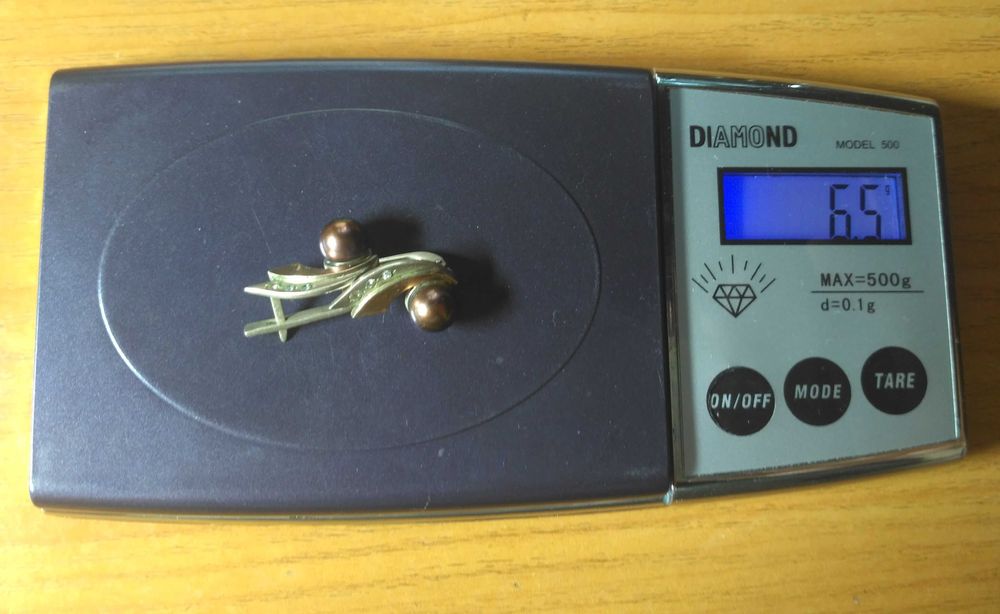 Сегьги серебряные со вставкой золота и черным жемчугом