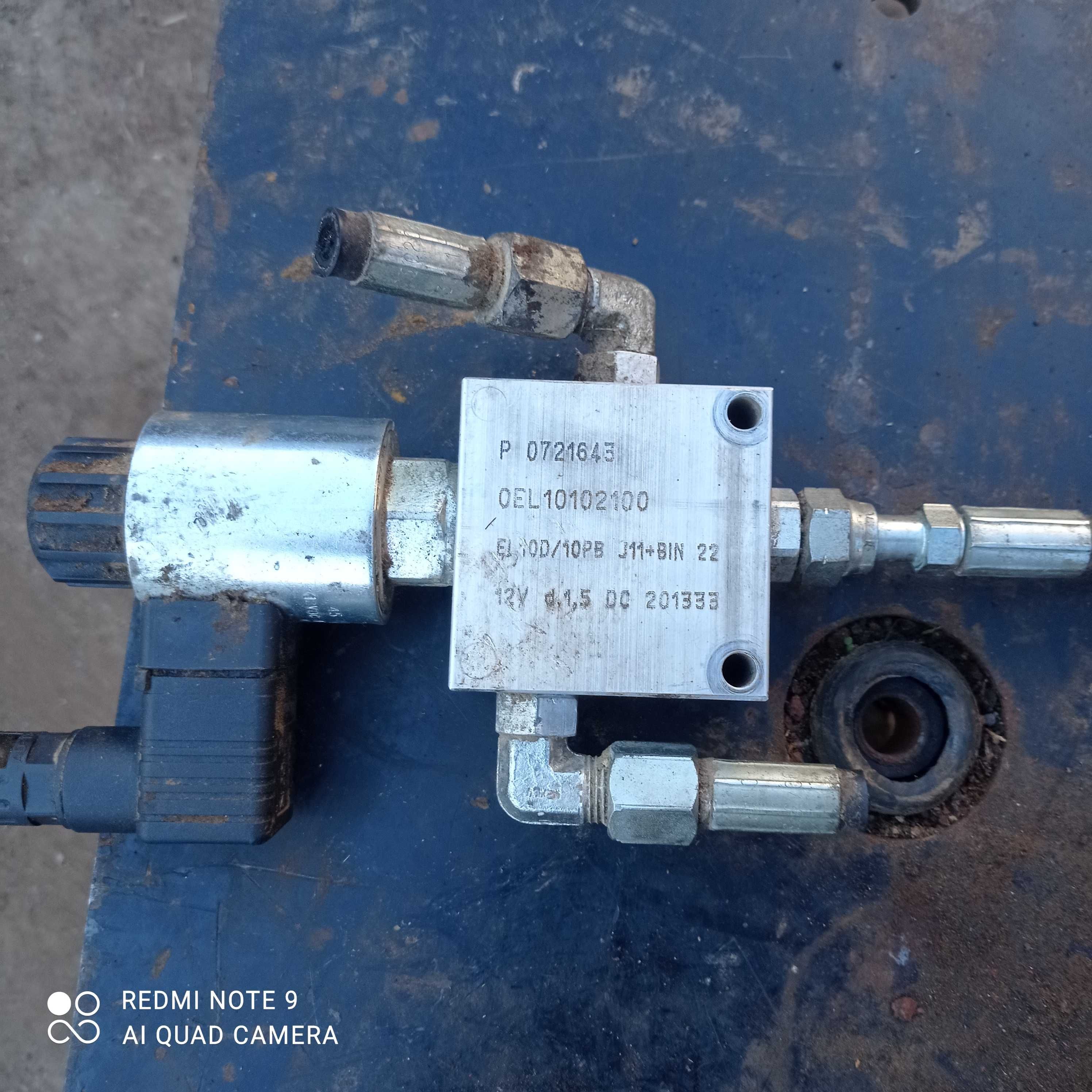 Prasa John Deere elektrozawór podnoszenia podbieraka