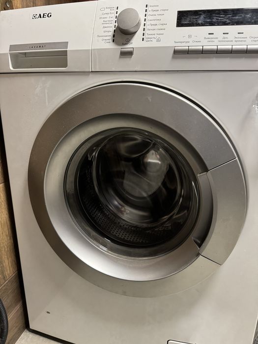 Стиральную машину AEG