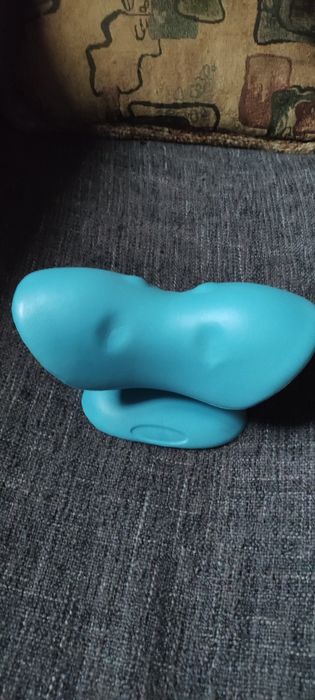 Масажна підставка для шиї