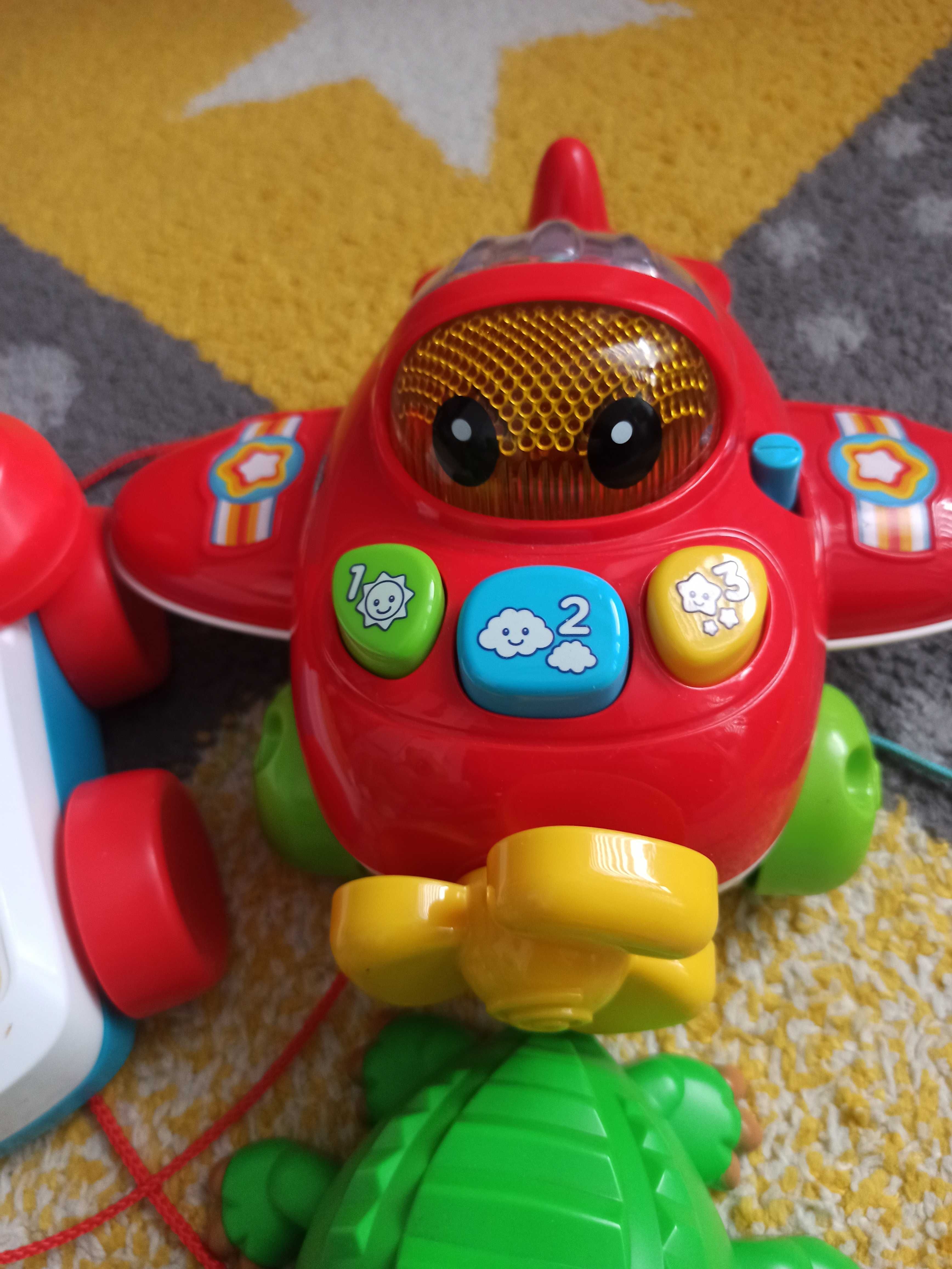 Zestaw zabawek Fisher price vtech telefon łoś dino samolot