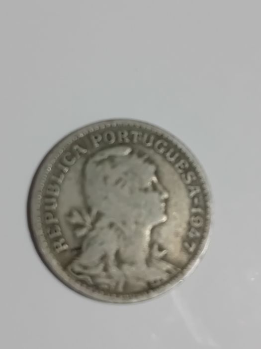 Moedas 50 centavos  a mais antiga e de ano 1930