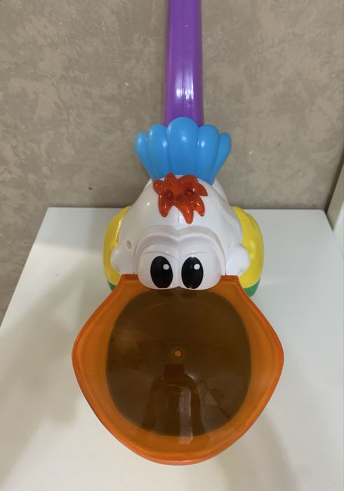 Іграшка Каталка пелікан  kiddieland Украінська