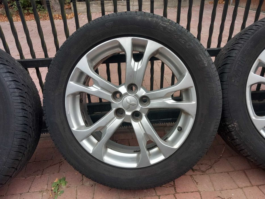 Felgi aluminiowe Mitsubishi Outlander III R18, opony Platin koło zapas