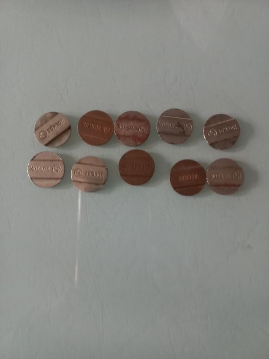 Старі жетони  зв'язку.