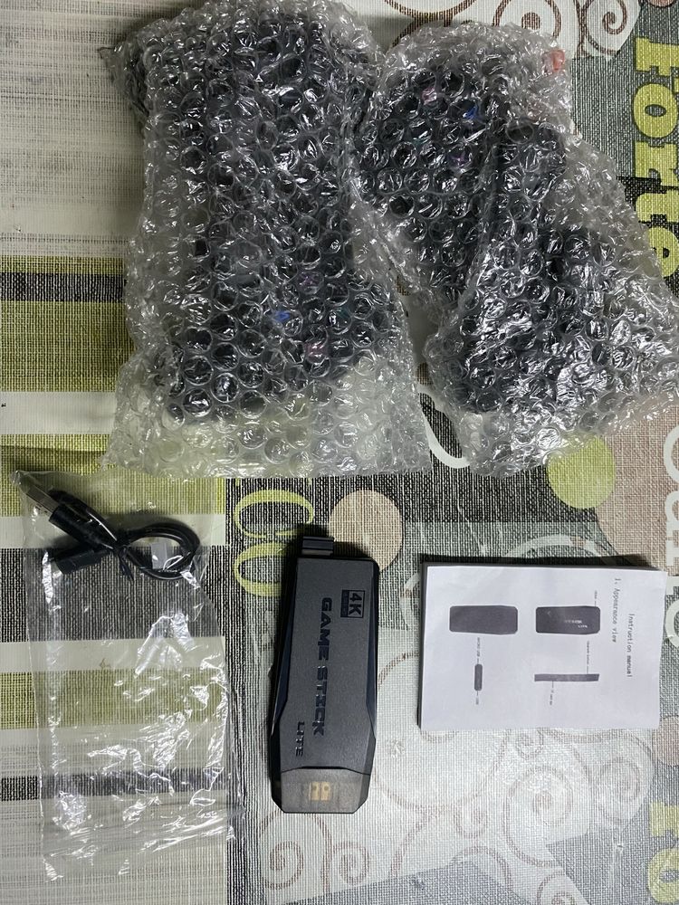 Game stick 4k 10000 jogos com 2 comandos por bluetooth