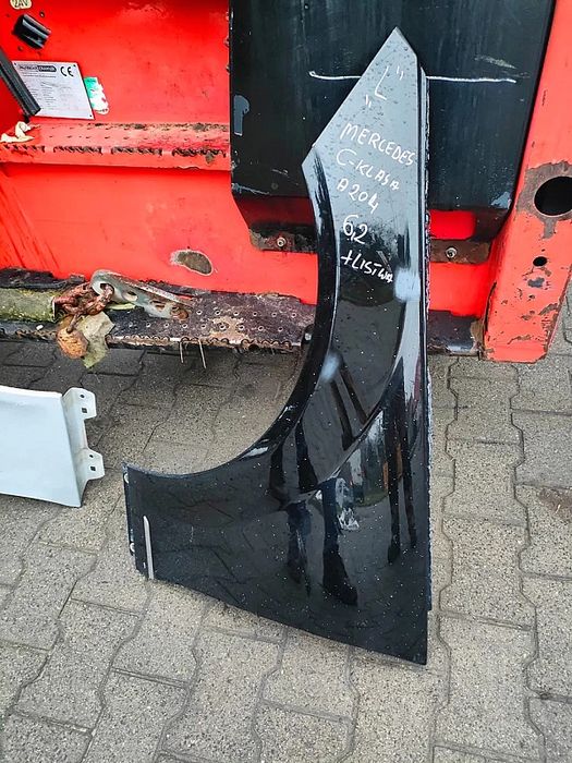 Błotnik Mercedes C-Klasa A204 lewy + listwa