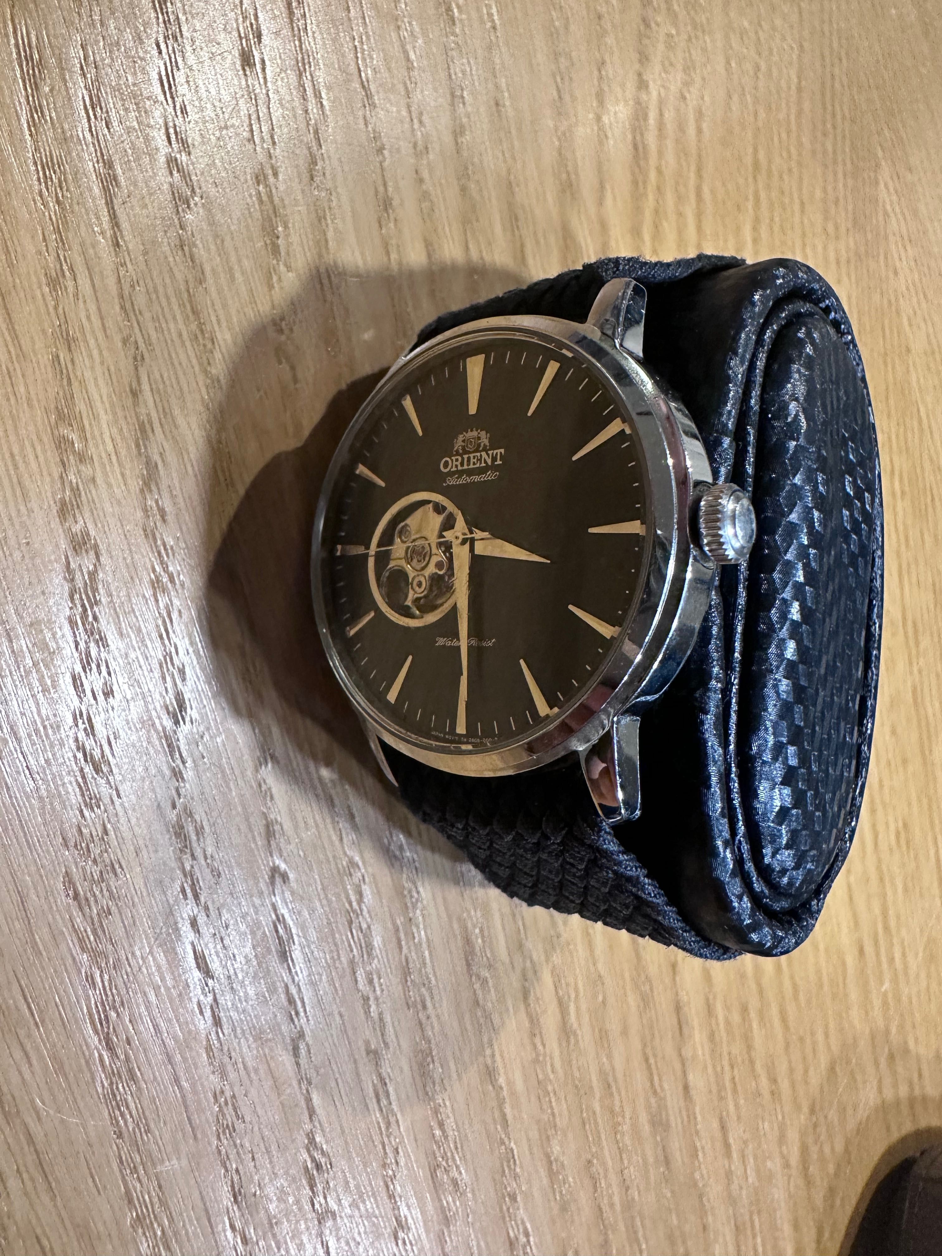 Orient esteem open heart automatic