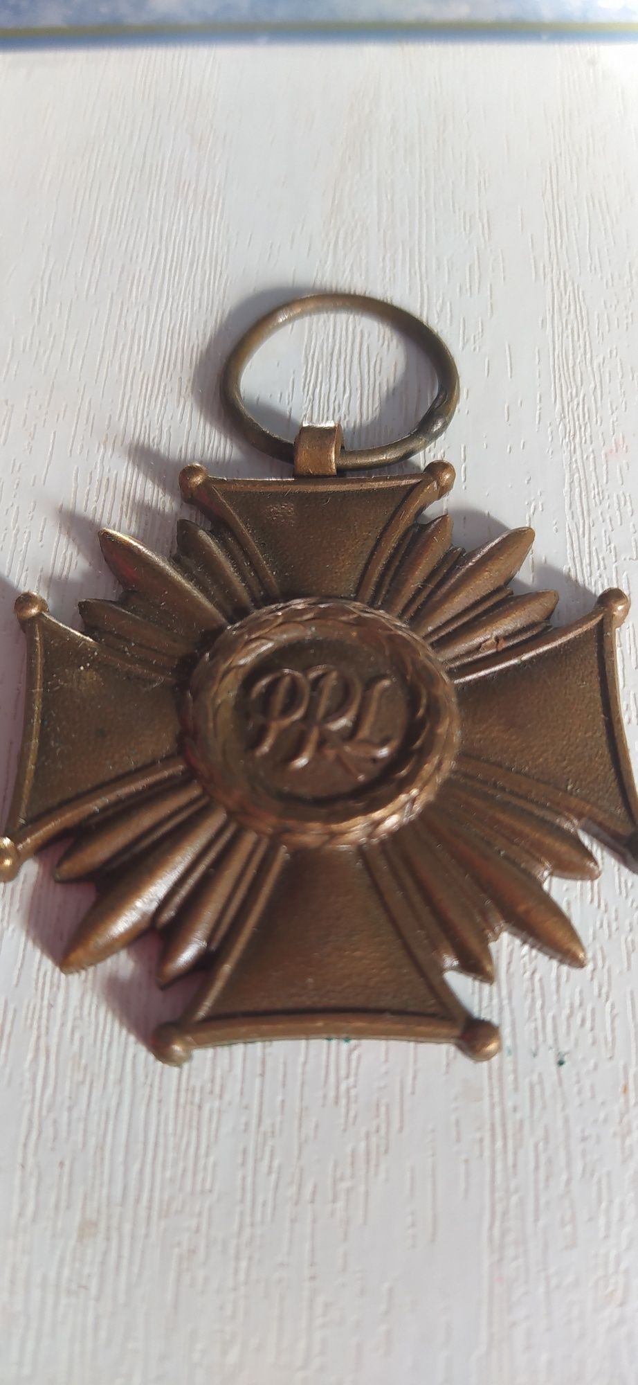 Medal Krzyż Zasługi.