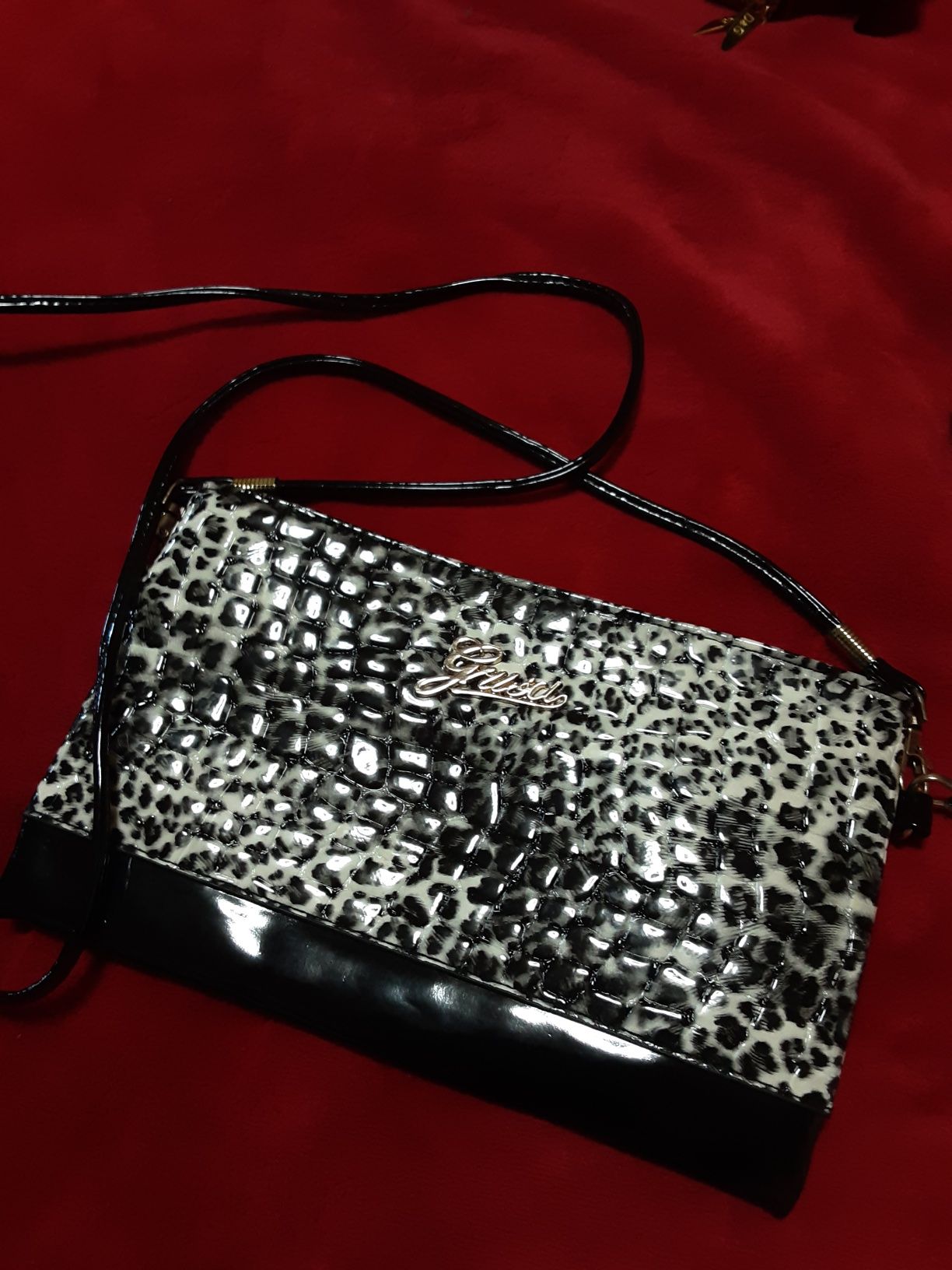 Mala pochette leopardo