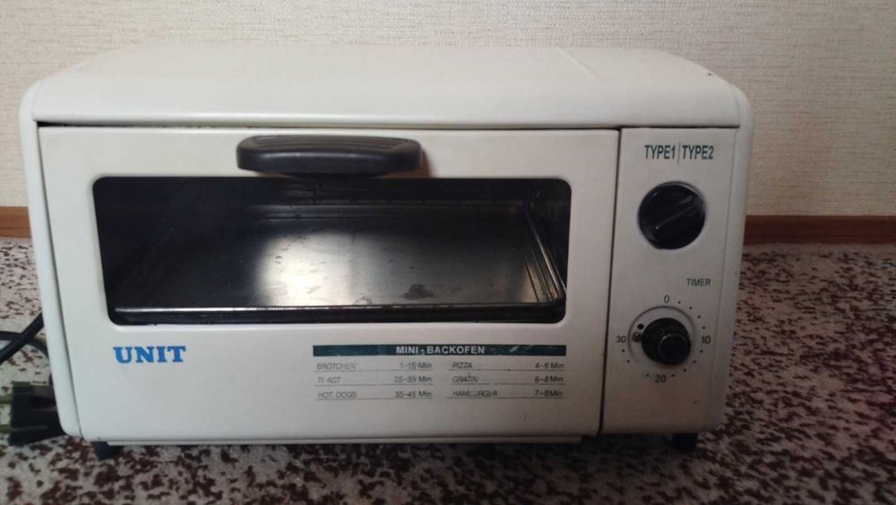 Тостер UNIT рабочий