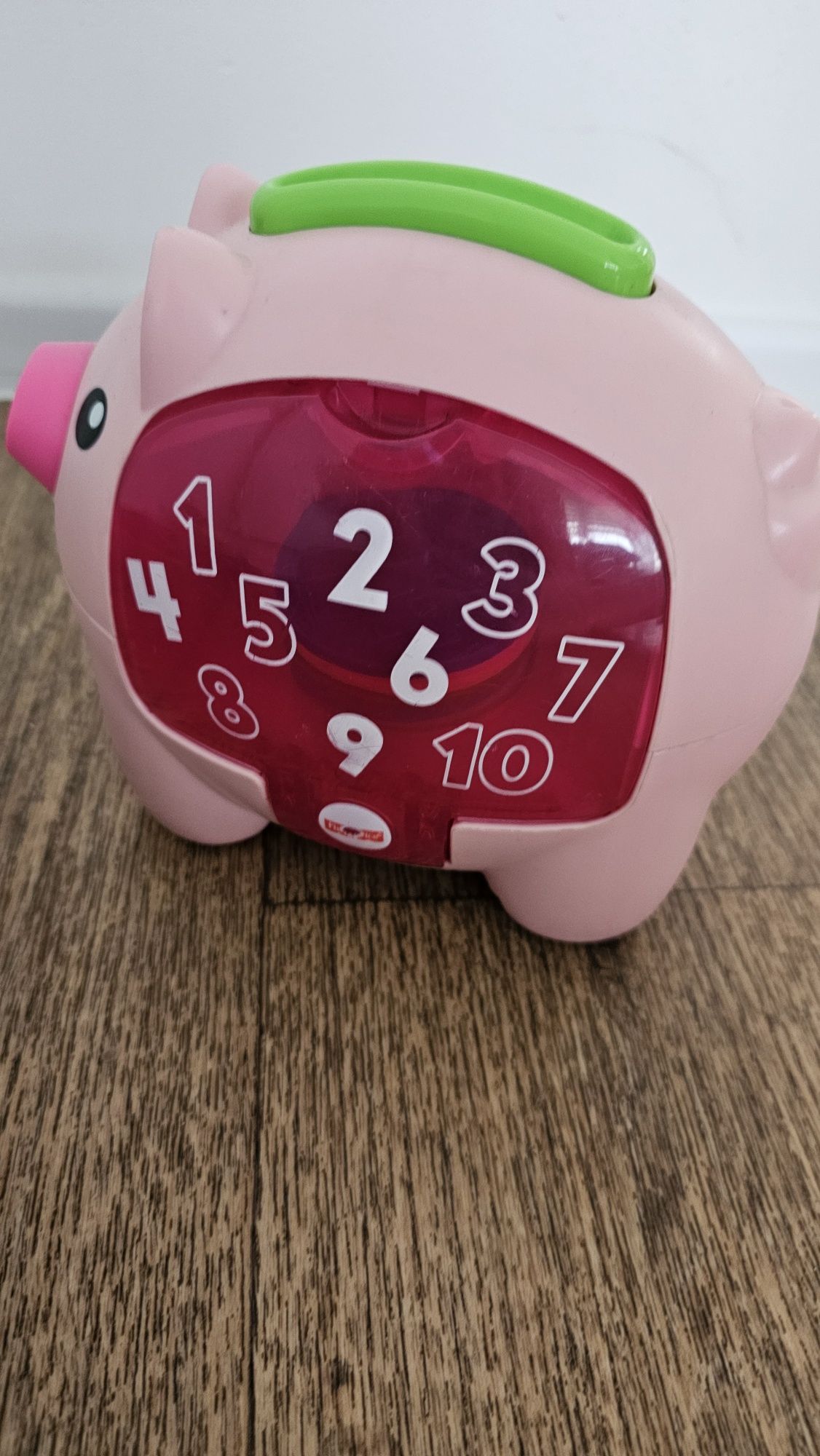 Zestaw zabawek, świnka skarbonka fisher price sorter dinozaury klocki