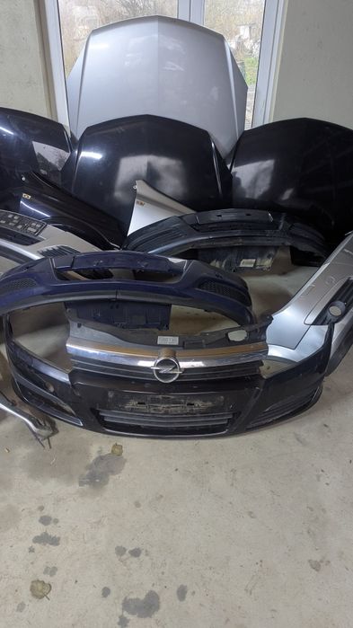 Бампер Opel astra h