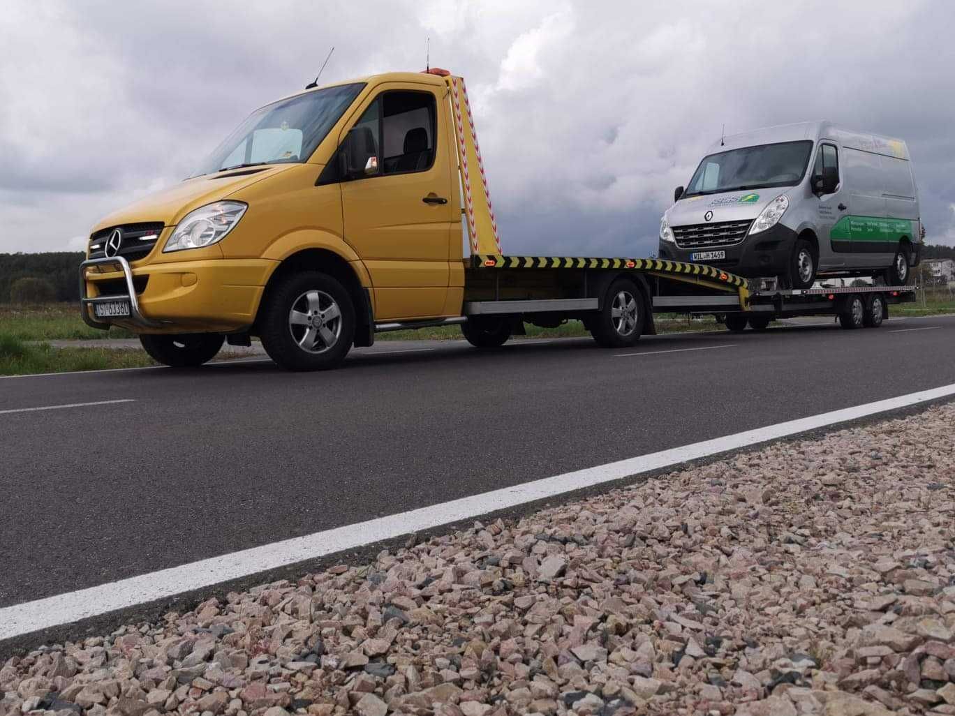 POMOC DROGOWA autolaweta laweta autoholowanie transport busów maszyn