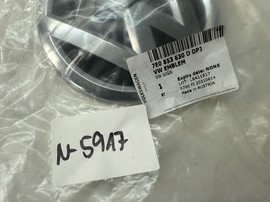 VW T5 Lift T6 Emblemat klapy Tył Nowy Oryginał 7E0853630D