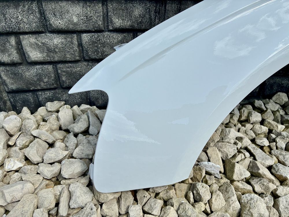 Blotnik przedni lewy bez rdzy bialy AUDI A4 B8 FL lift 12-16 oryginal