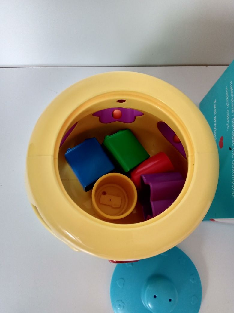 Garnuszek na klocuszek fisher price