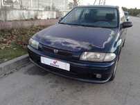 Mazda 323 2.0D      .