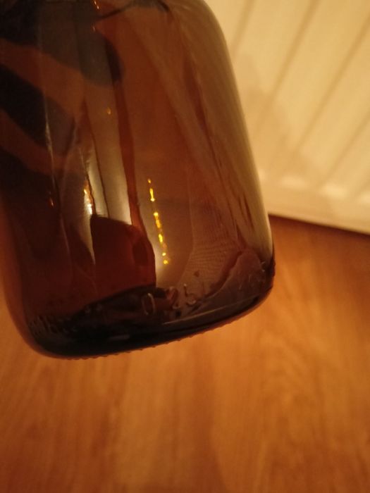 Butelka buteleczka od oliwy z uchwytem uchem brązowa 0,25 litra mała