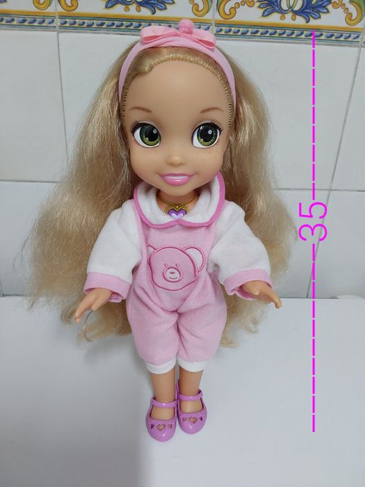 BONECA BONITA da DISNEY com a canção (Eu vejo a luz) da disney.8 fotos