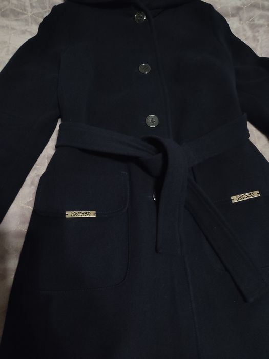 Осіннє жіноче пальто