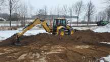 Usługi koparko ładowarką cat 444,prace ziemne,niwelacje,wyburzenia