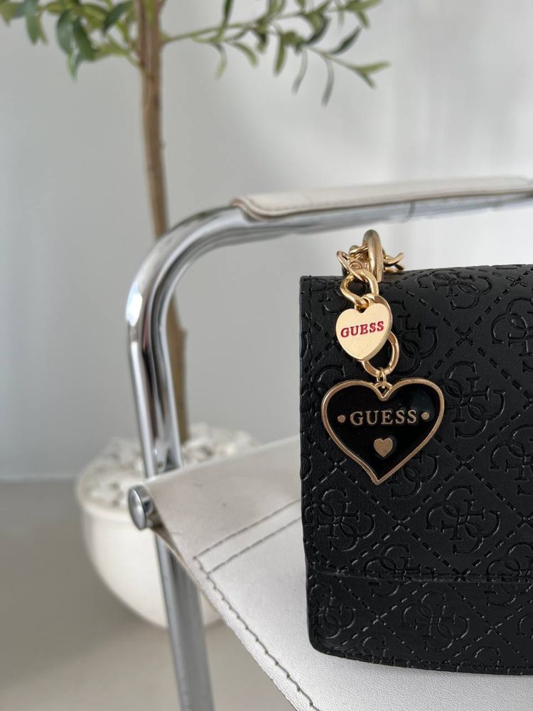 Guess heart black logo