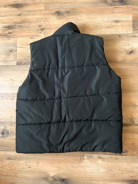 Тепла жилетка на застібці