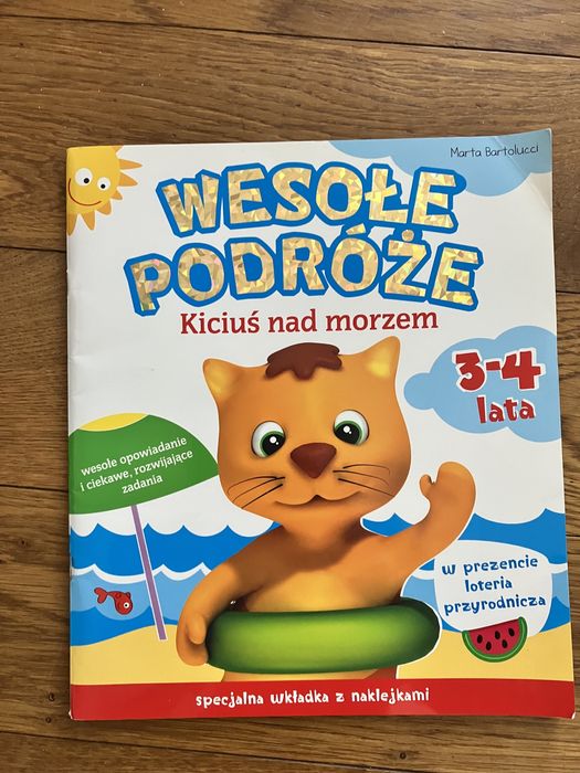 Wesołe podróże kiciuś nad morzem nowa książeczka z naklejkami