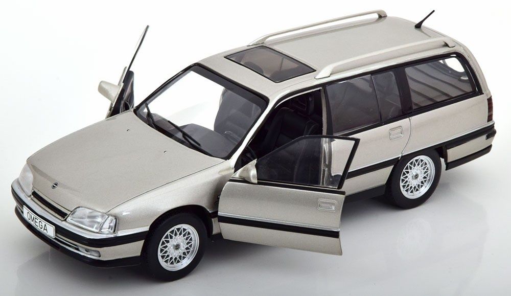 OPEL Omega A2 Caravan(1990),м-б 1:24 - WHITEBOX - открываются двери.