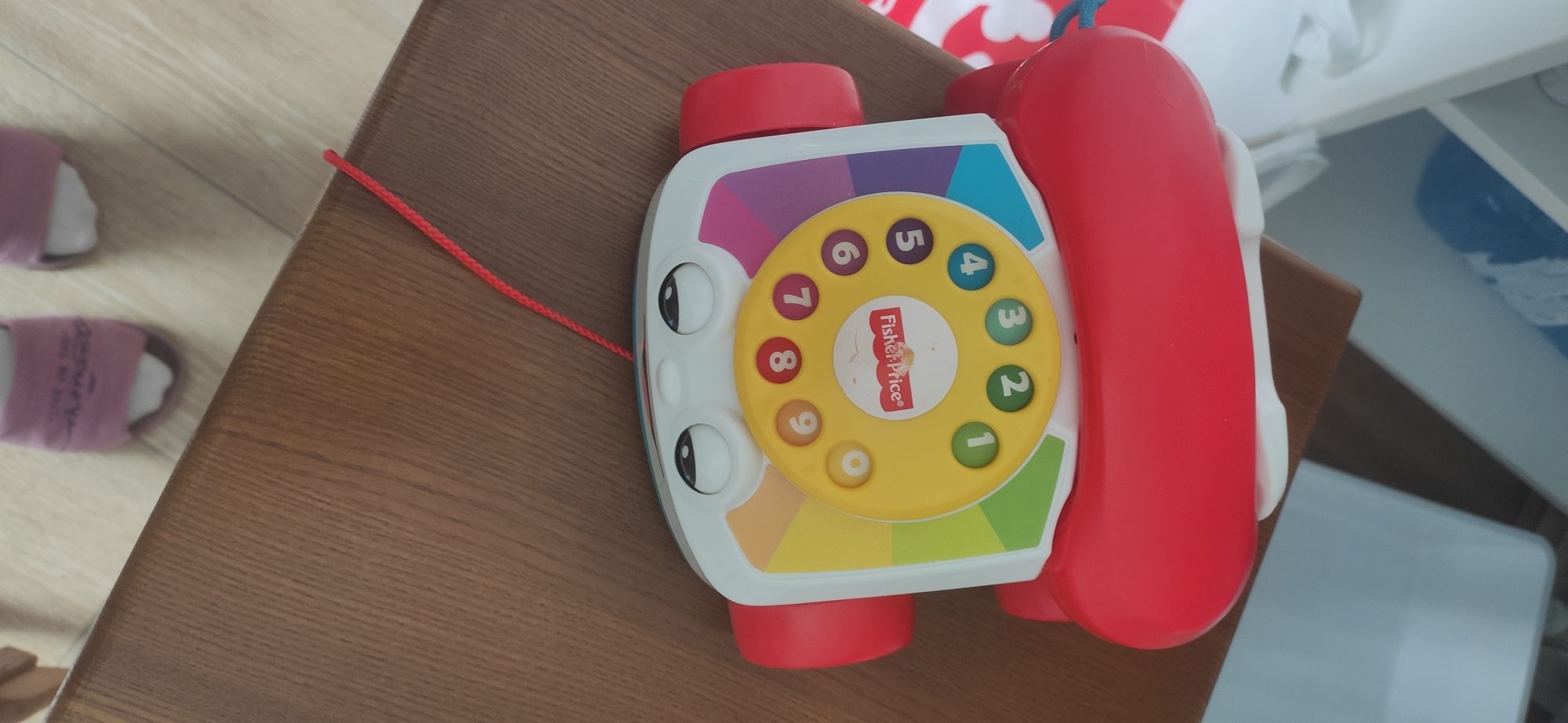 Игрушка каталка fisher price