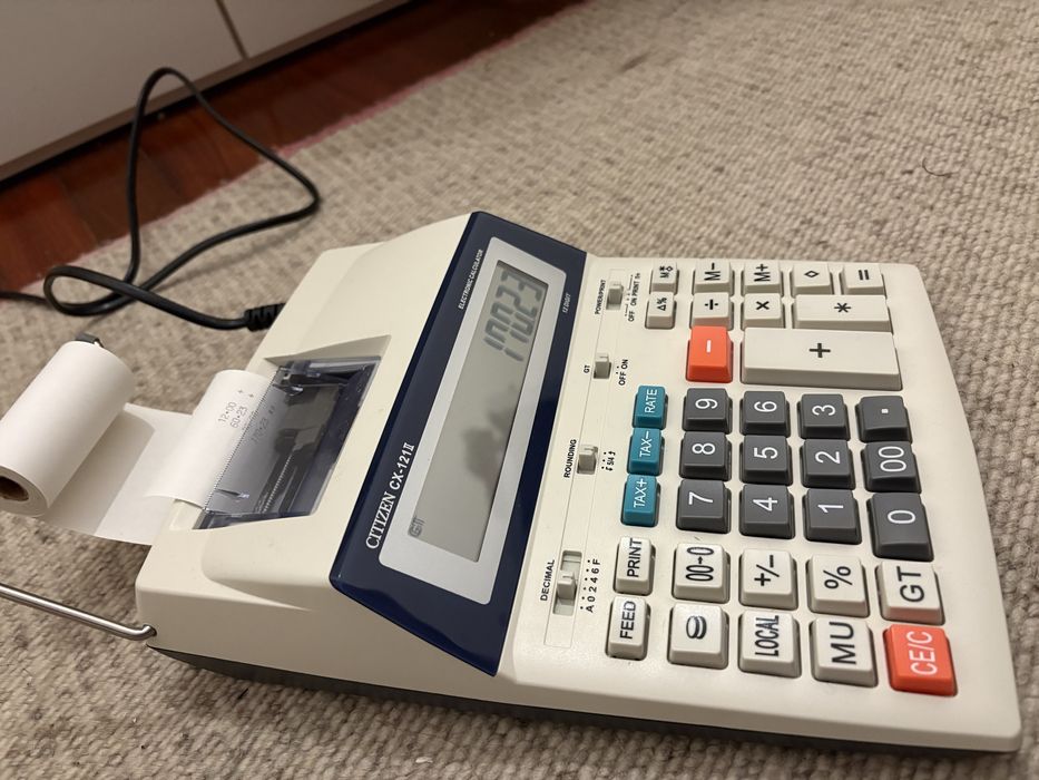 Calculadora de impressão com caixa e instruções