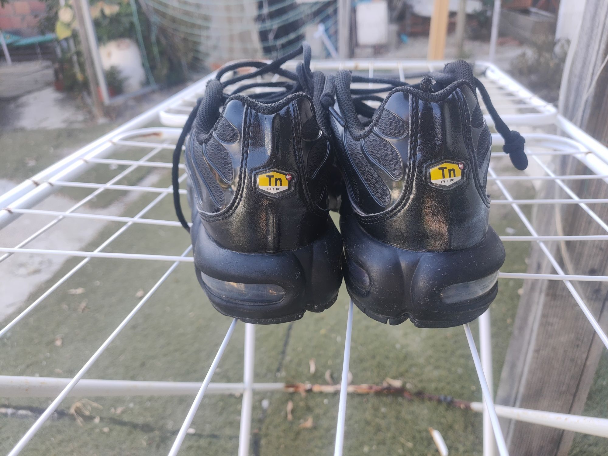 Tênis pretos Nike