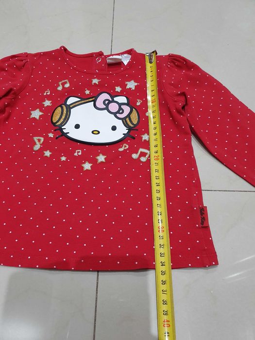 H&M Hello Kitty brokatowa bluzeczka dla dziewczynki rozmiar 92