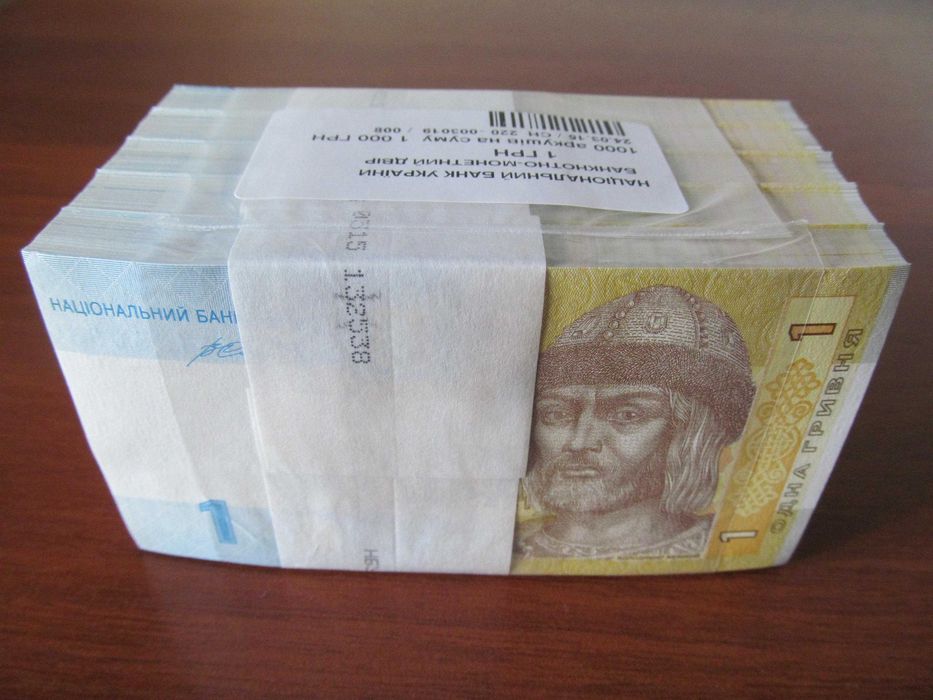 1 гривня 2014рік 5корінців по 100штук